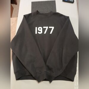 Fear of God 1977 Black Sweatshirt with White Graphics